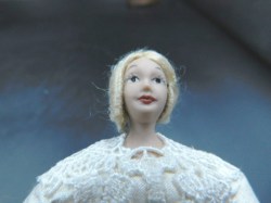 blonde dollhouse white lace face